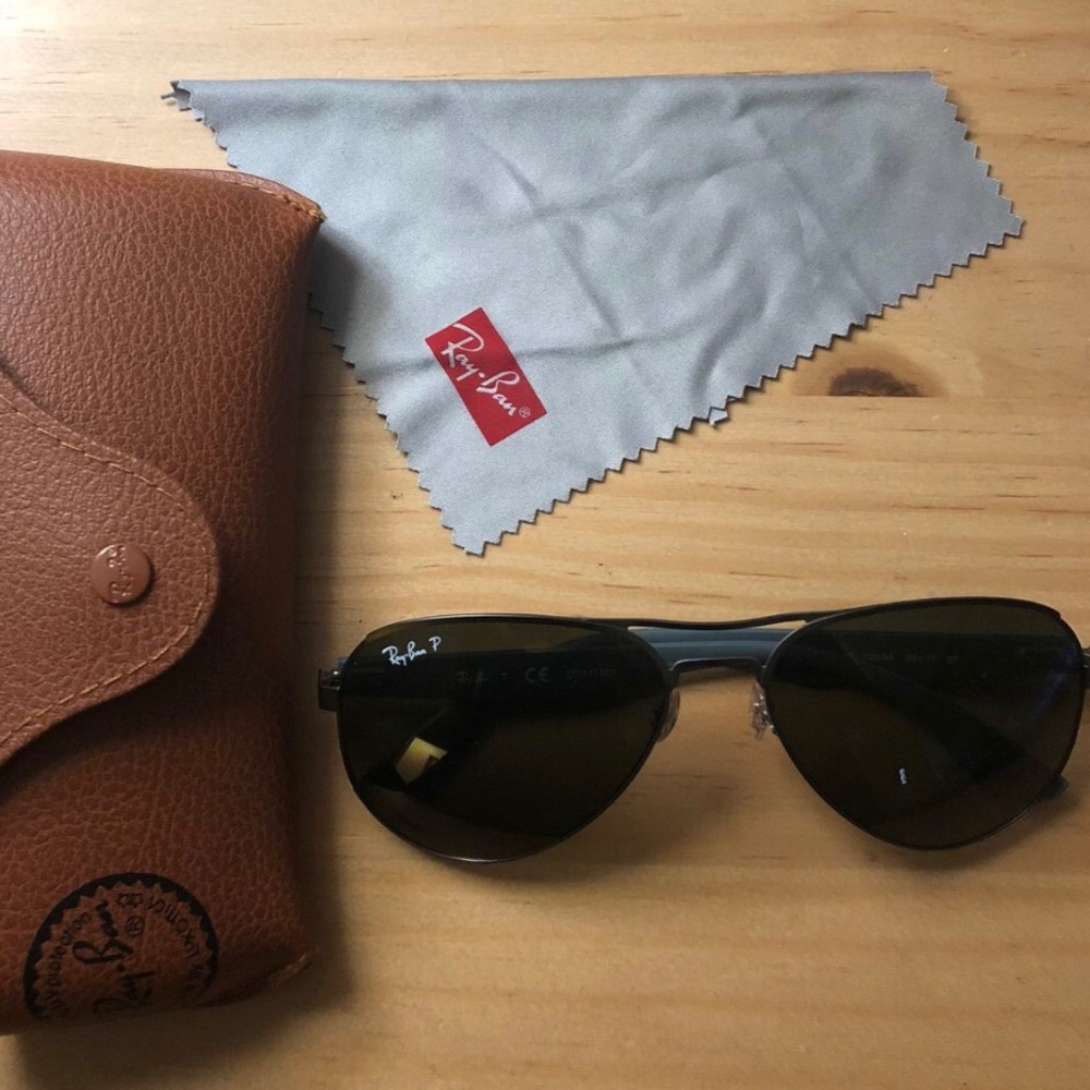 Ray Ban glasses.